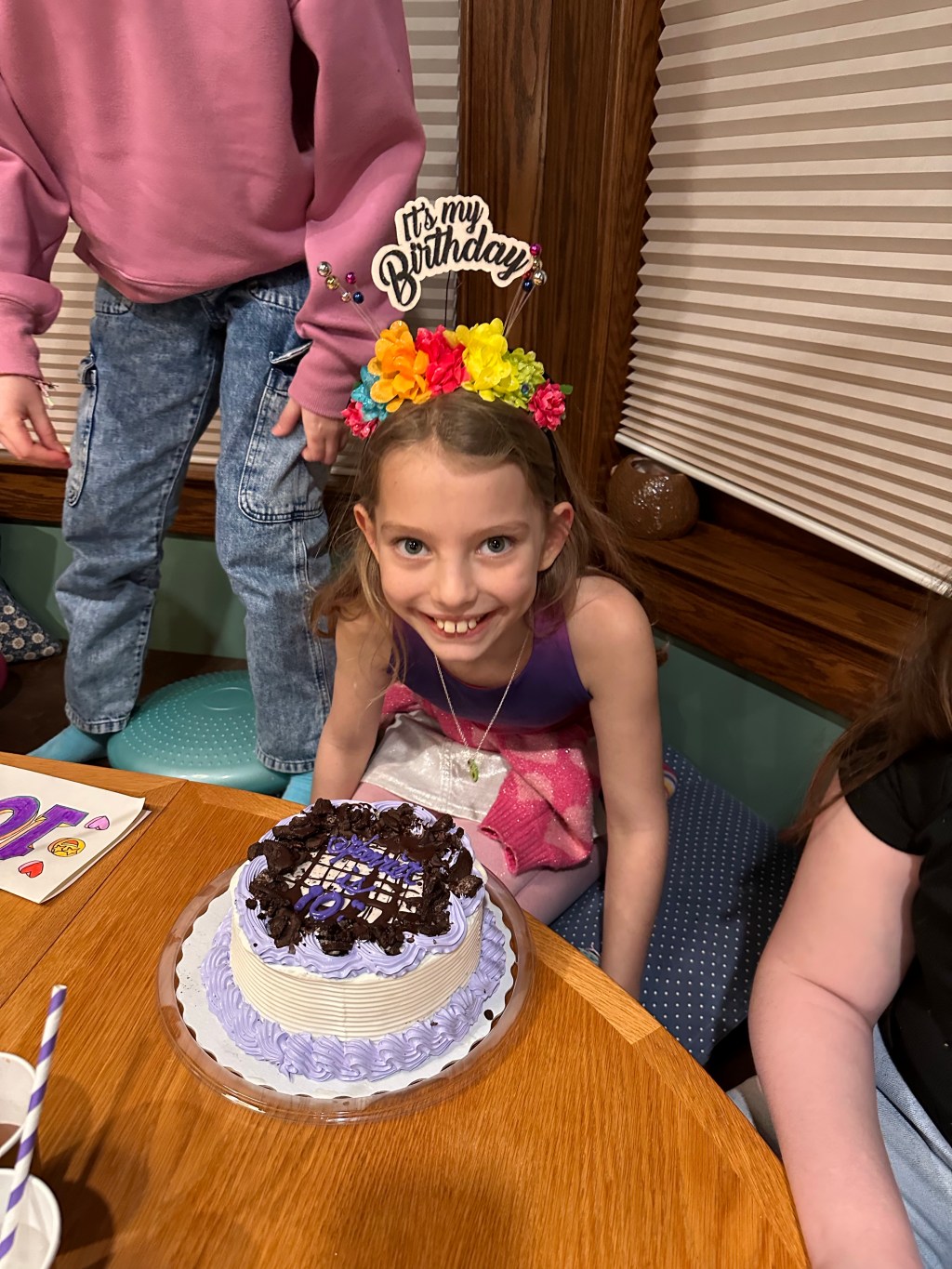 Harriet wit her ice cream cake, wearing a birthday crown